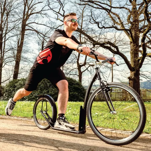 man_onpath_med man footbiking on path